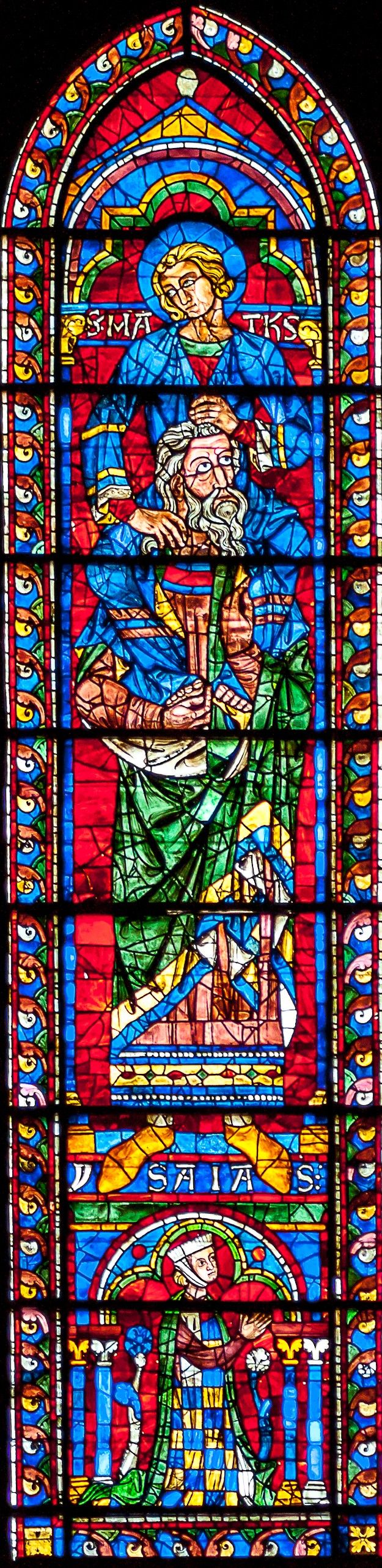 Stained glass: Matthew on the shoulders of Isaiah