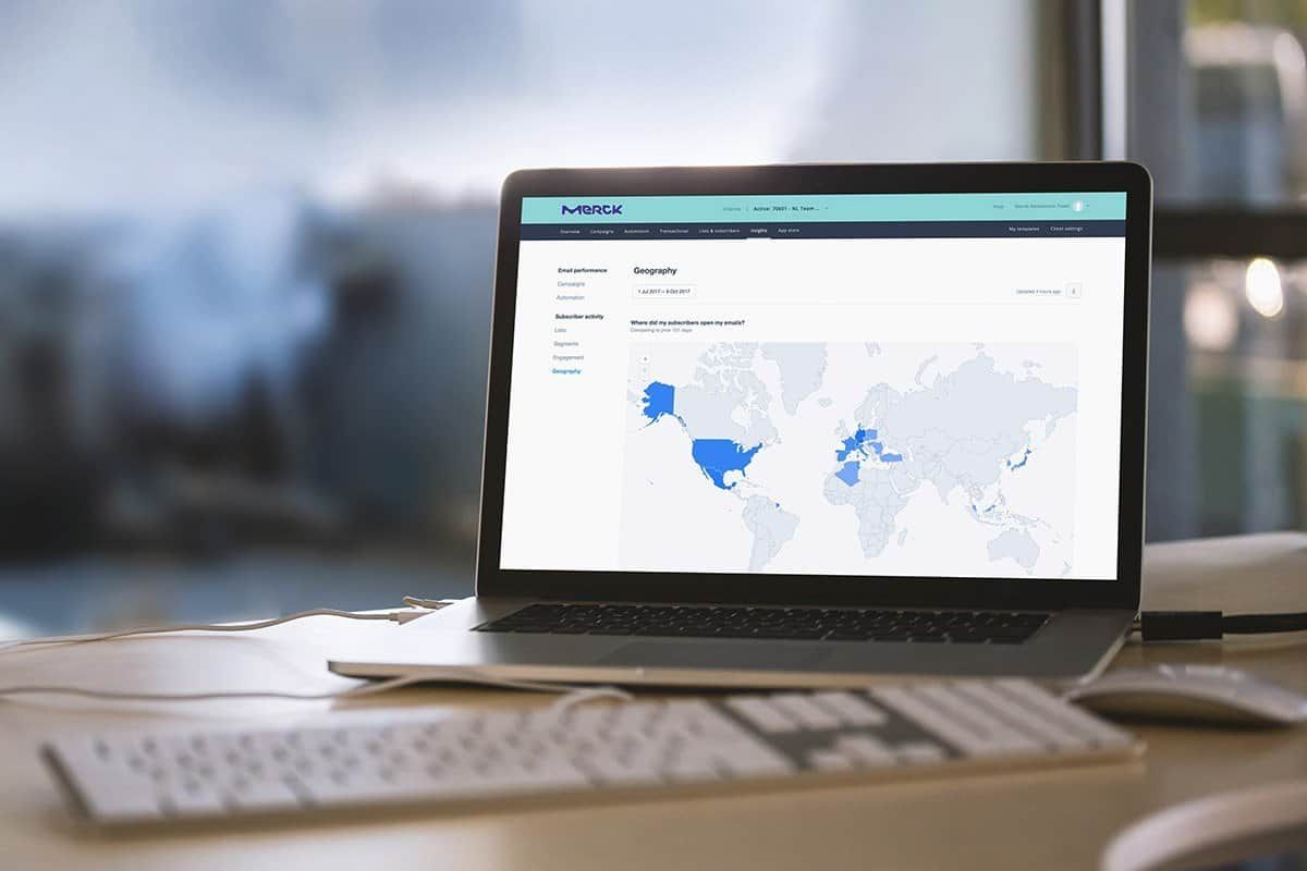 Laptop showing the Geography report: a world map of where subscribers opened the newsletters