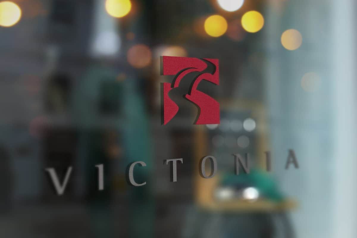 The Victonia bridge mark and wordmark on the glass door of the office